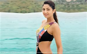 Affable Shilpa Shetty in beach wear